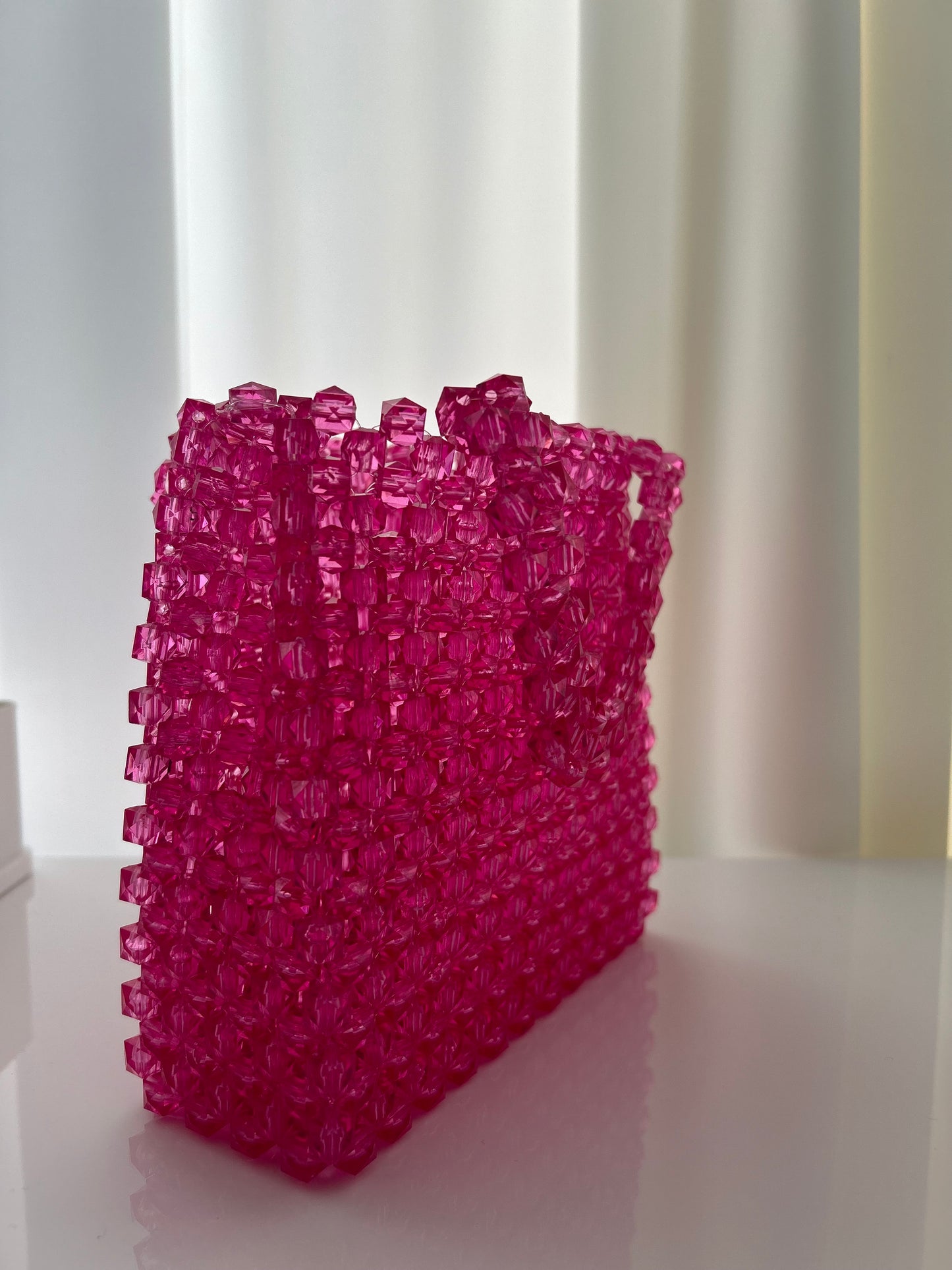 Elegante pinke Perlenhandtasche