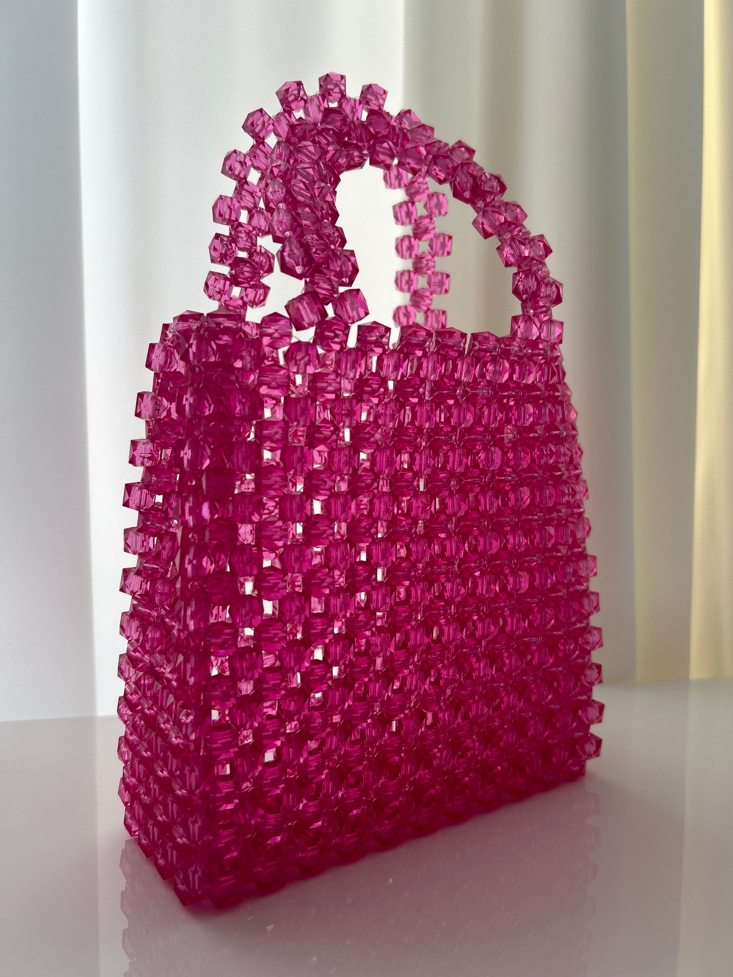 Elegante pinke Perlenhandtasche